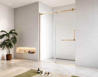 Modern bathroom with a glass shower enclosure, plant, and minimal decor.