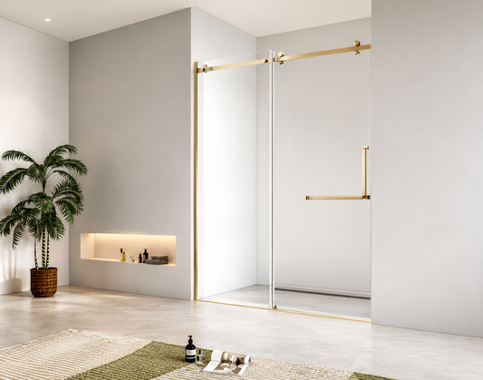 Modern bathroom with a glass shower enclosure, plant, and minimal decor.