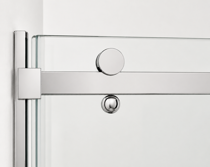 Close-up of a shower door with chrome fixtures on a white background