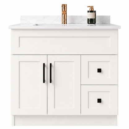 White bathroom vanity with Quartz countertop and fixtures on a white background